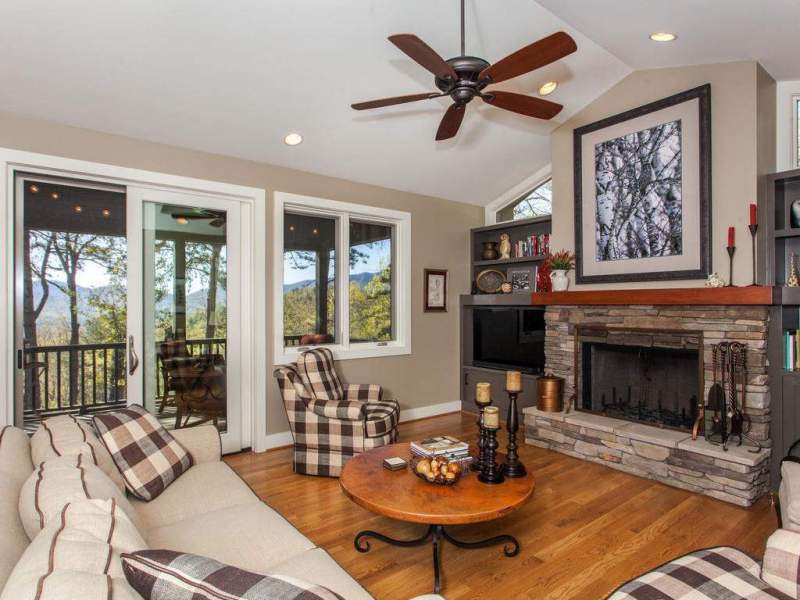 Family room with a stone fireplace