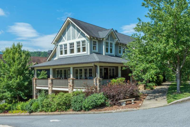 Arts and crafts home with wraparound porch