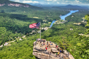 American flag on a rock blowing in the wind