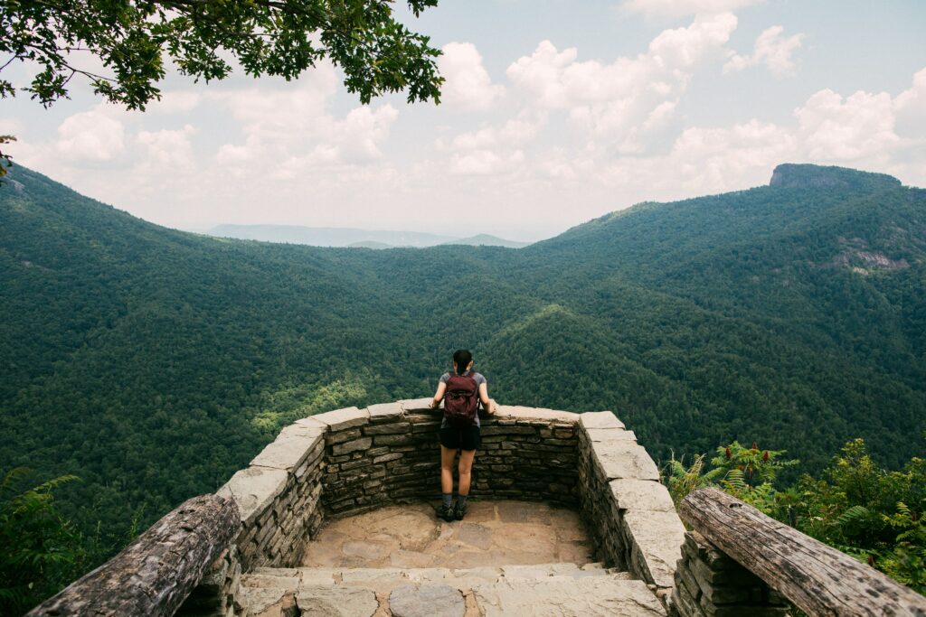 A woman at a mountain overlook